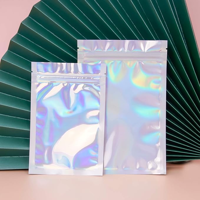 100 Pieces Resealable Smell Proof Bags - Foil Pouch Bags， Flat Clear Food Storage Plastic Packaging Foil Mylar Bags for Party Favor Food Storage (Holographic Color, 7x9 Inch)