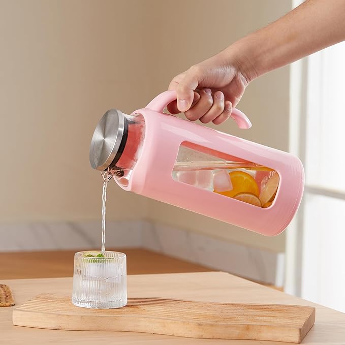 Delove Glass Pitcher with Lid & Shatterproof Shell – Heat-Resistant