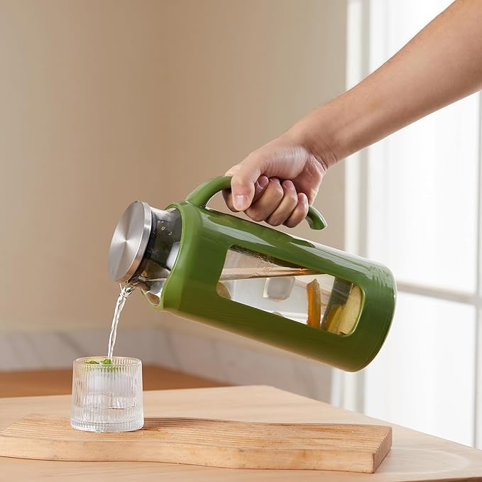 Delove Glass Pitcher with Lid & Shatterproof Shell – Heat-Resistant